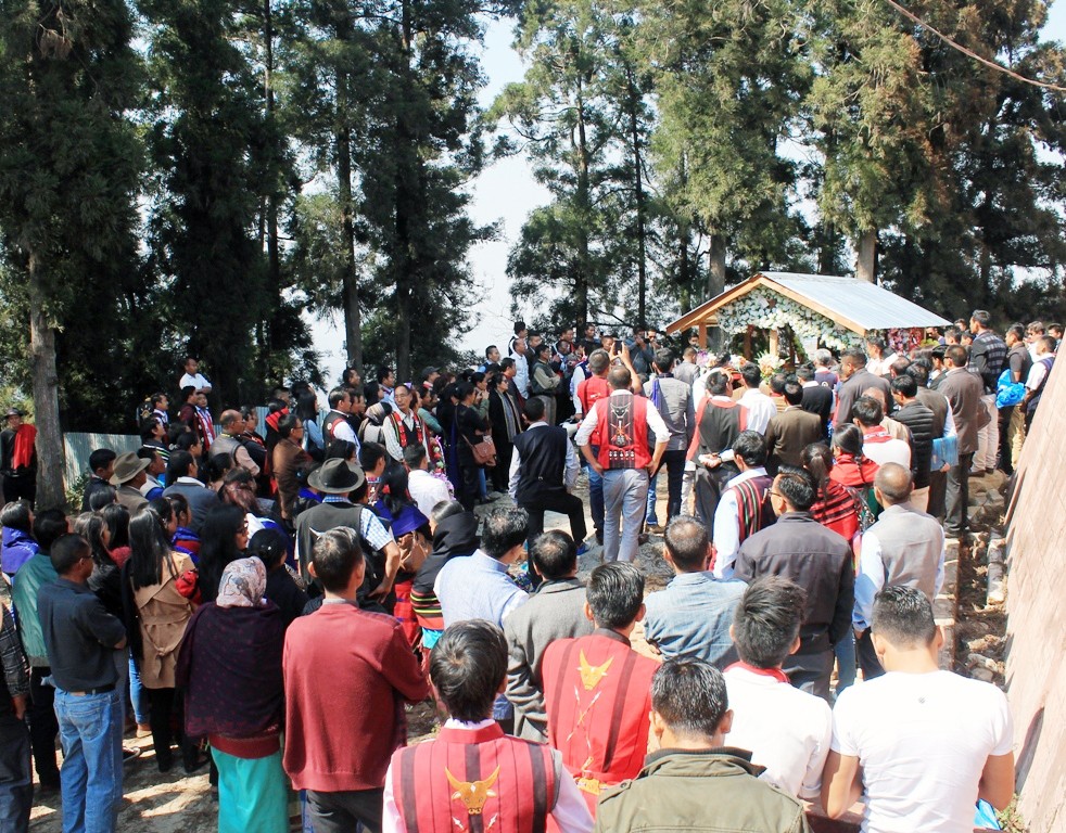 Diphupar Village Council members and others pay tribute to late Khriesavizo Metha and late Bendangnunsang Longkumer on February 25. (Morung Photo)